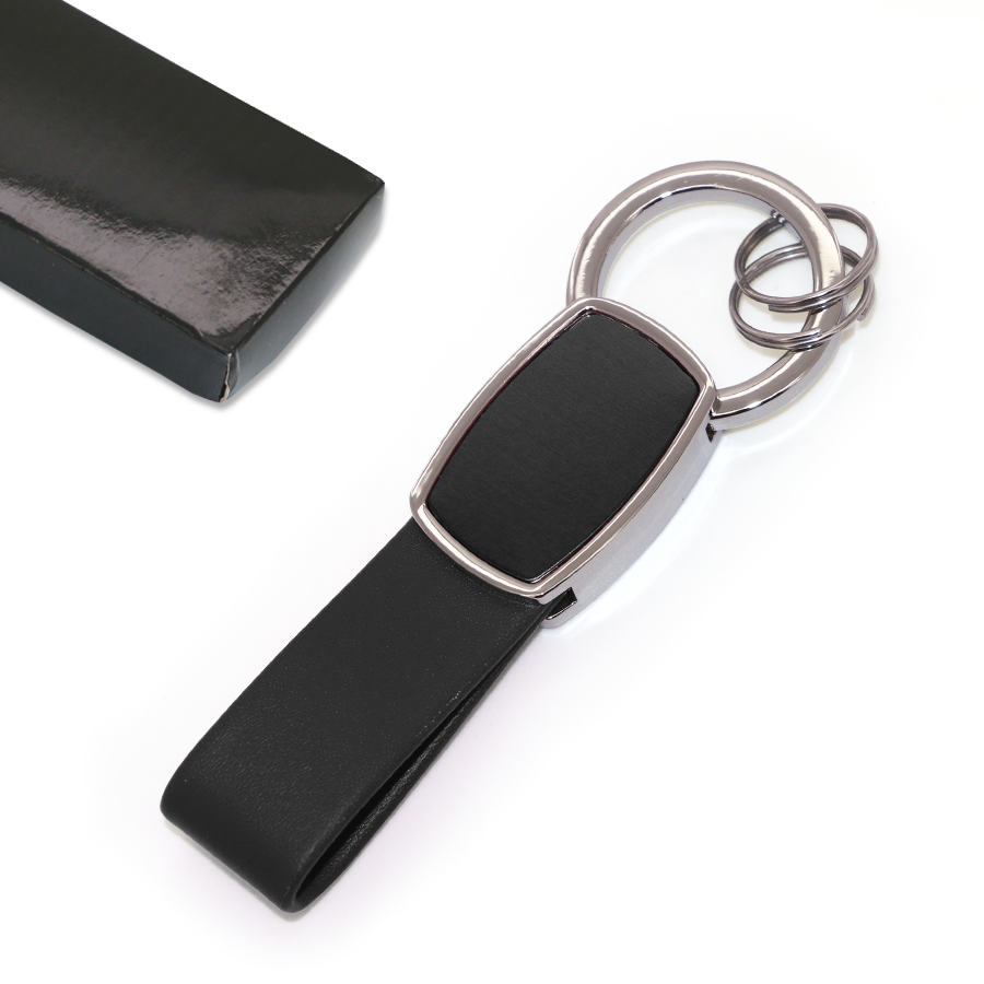 porte-clés publicitaire en métal et similicuir